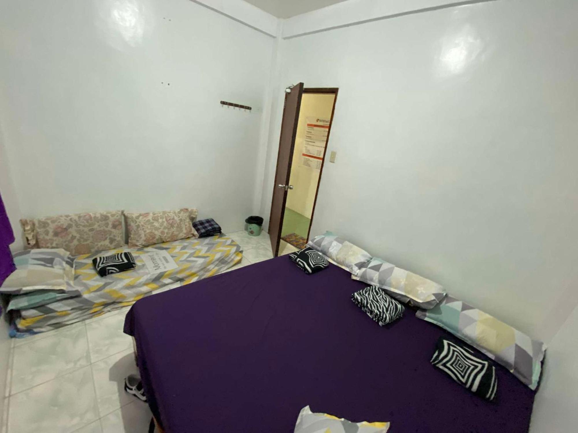 Estrelle Orange House - Backpackers Hub Appartement Puerto Princesa Buitenkant foto